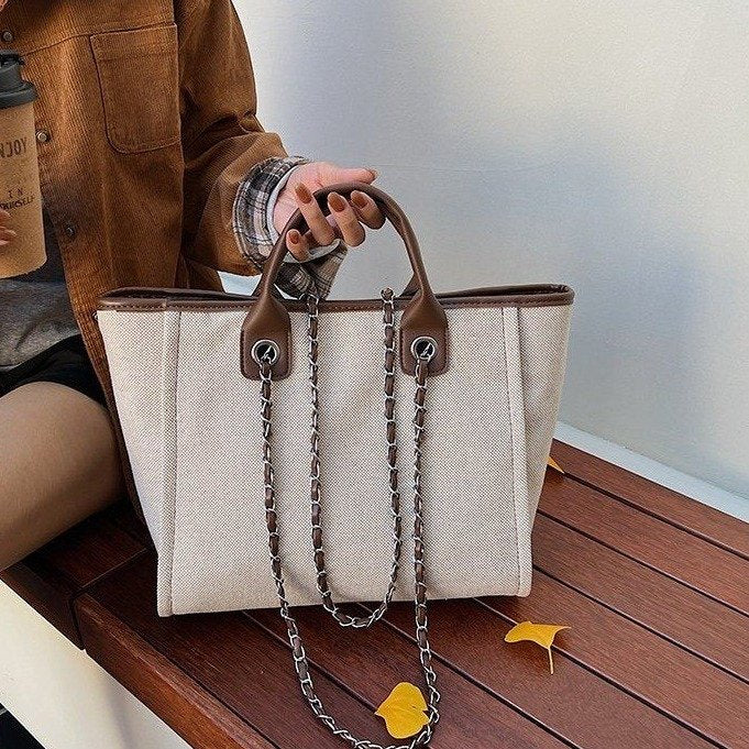 209USD -Brown Fashion: A Handbag That Interprets Fashion and Practicality- three  identical bags